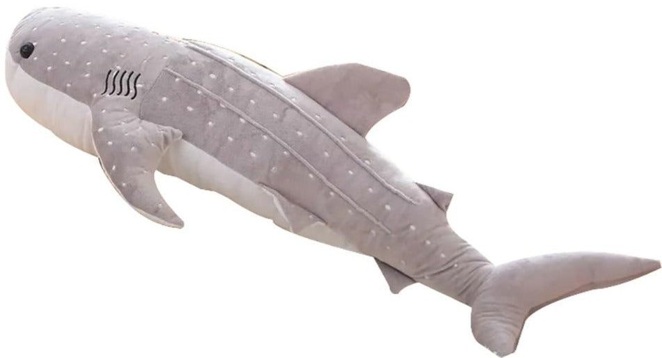 Giant whale shark plushie lifestyle shot on bed