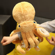 Close-up detail shot of lifelike octopi plushie face embroidery and soft fabric