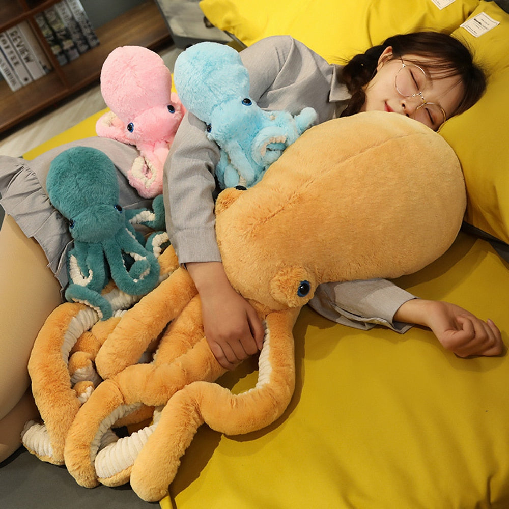 Side angle of lifelike octopi plushie showing plush texture and stitching quality