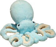 lifelike octopi plushie displayed in cozy room setting with kawaii decor